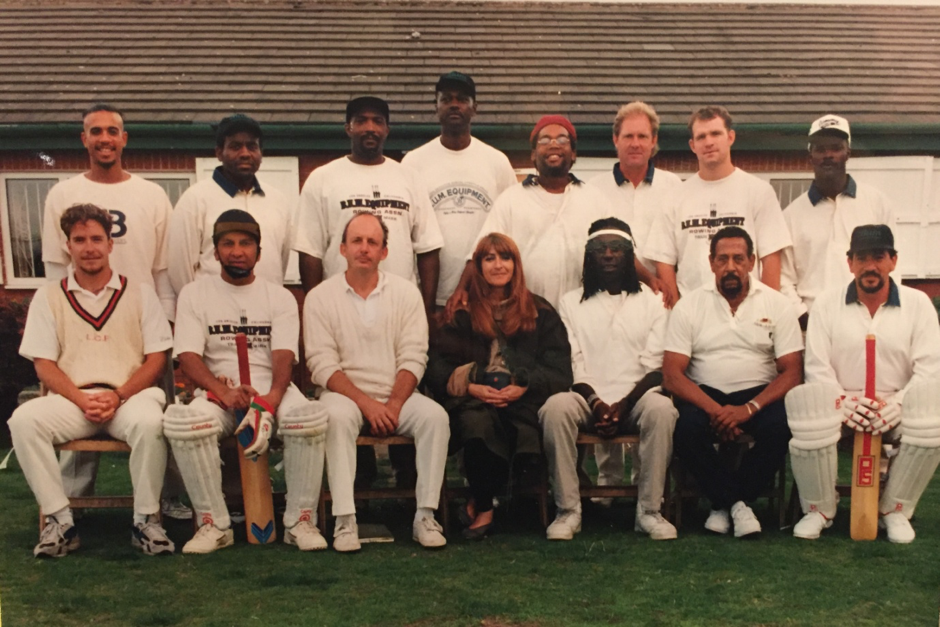 LA Krickets team photo prior to first game of the tour at Blackrod CC, Bolton, Lancashire. September, 1995. (Mustafa Khan is 4th from left, back row. Front row from left: Stephen Speak, Mark Azeez, David Sentance, Katy Haber, Ted Hayes)