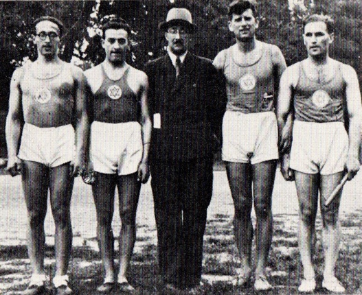 The winning relay 4 x 400 in 1937 Austrian championship left to right - Präger, Kaiser, coach Bierbrauer, Deutscher, König